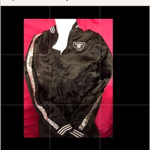NFL for her Raiders bomber jacket. Sz L